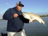 Darrin and silver redfish.JPG